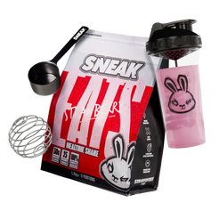 SNEAK protein shake package with shaker, scoop, and pink container on a white background